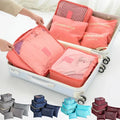 Set of six travel packing cubes for clothes and shoes