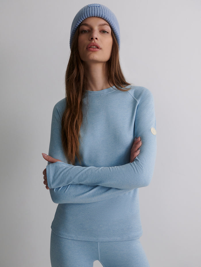 Glacier Blue|Always Warm Crew-Neck Baselayer in Glacier Marl with thumbholes, curved sleeves and branded Alpine patch.