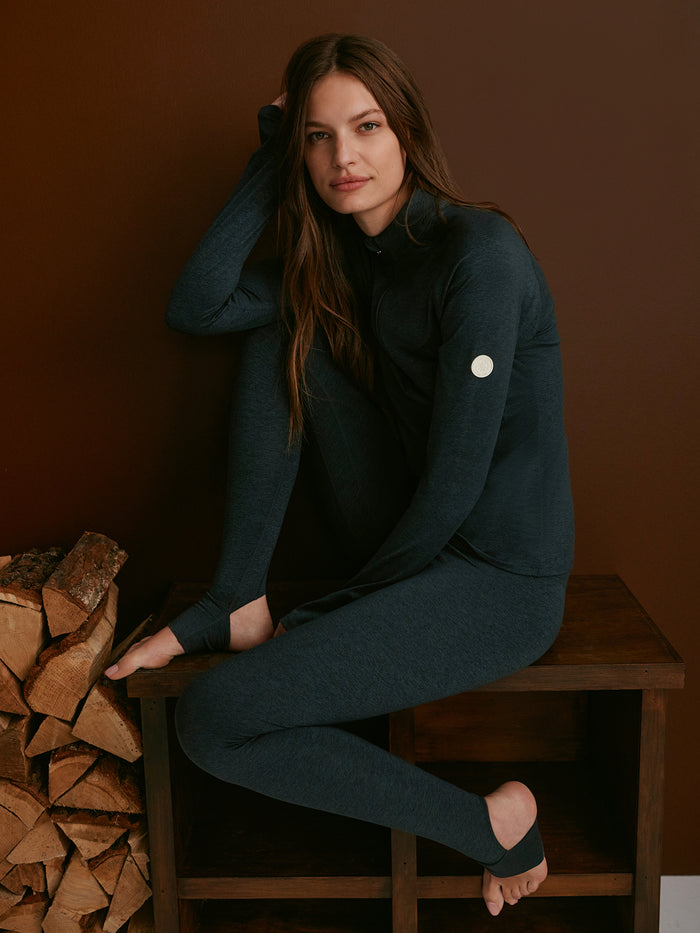 Black Marl|Always Warm Stirrup Legging in Black Marl, four-way stretch baselayer with stirrup, high-rise with deep waistband for on- and off-piste comfort.