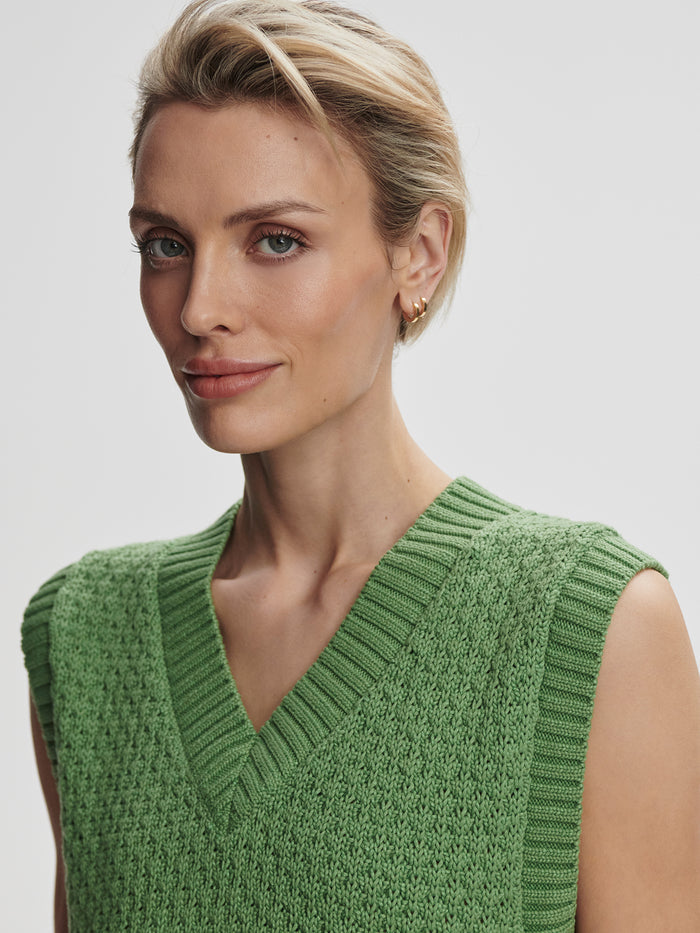 English Ivy|Antonella Knit Vest in English Ivy, green knit fabric; product shot highlighting its sleeveless design and textured knit.