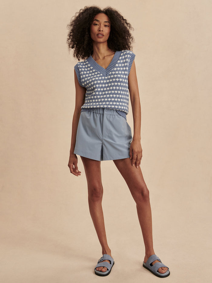 Infinity Blue|Antonella Knit Vest in Infinity Blue, front view of a sleeveless knit vest with textured fabric and ribbed trim.