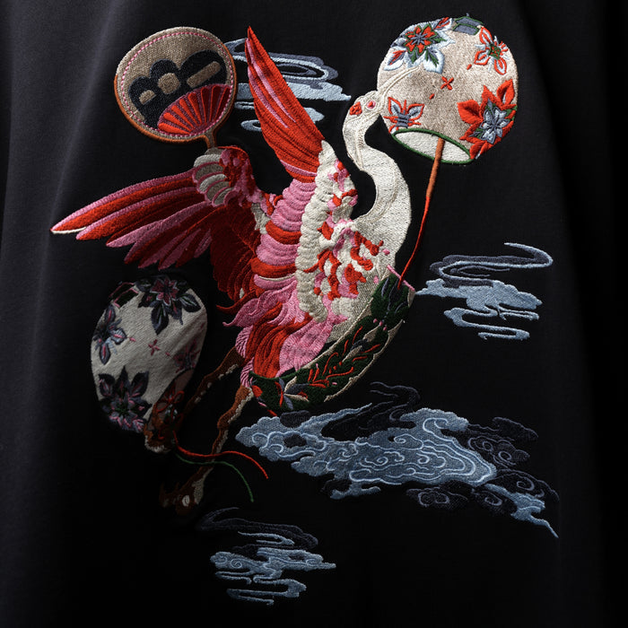 Premium black oversized tee crane design embroidery detail