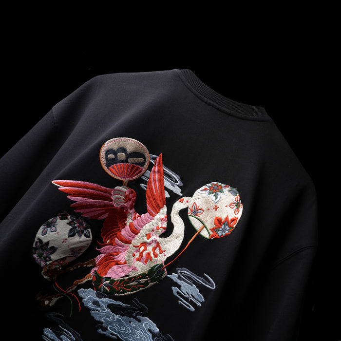 Premium black oversized statement tee crane embroidery