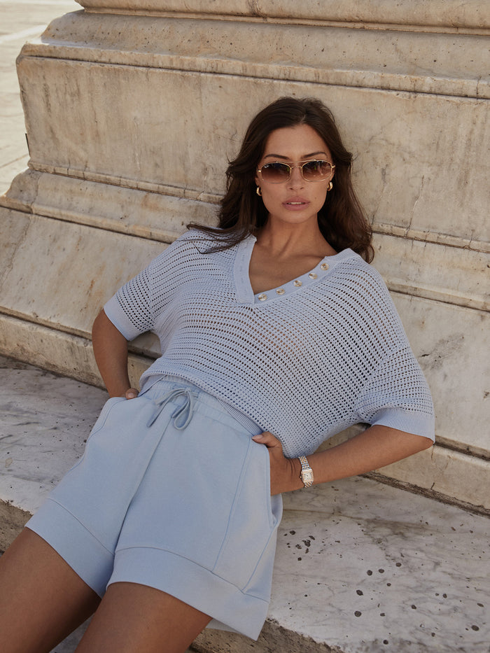 Cashmere Blue|Callie Knit Top Cashmere Blue, a soft cashmere knit top shown on a model with a relaxed fit.