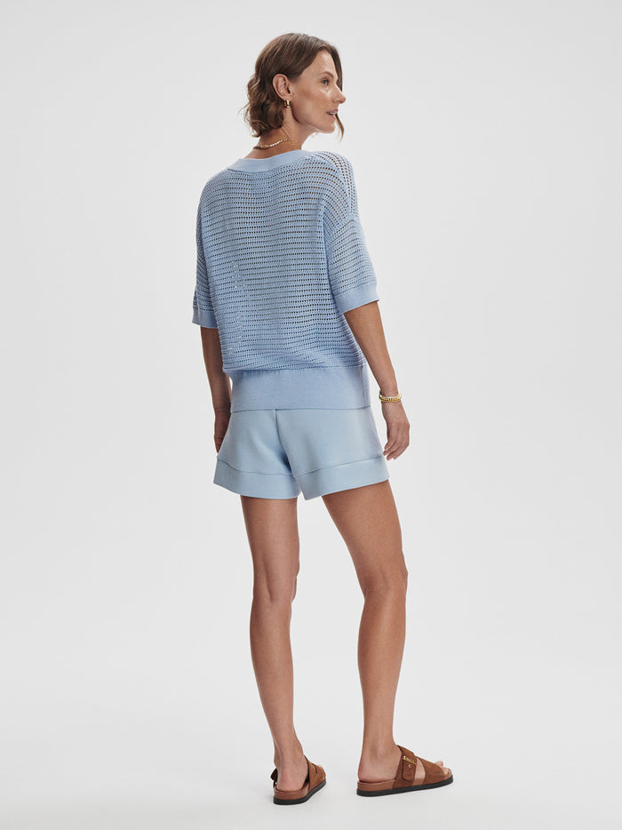Cashmere Blue|Callie Knit Top in Cashmere Blue, front view of a model wearing the soft cashmere knit top with long sleeves and a relaxed fit.