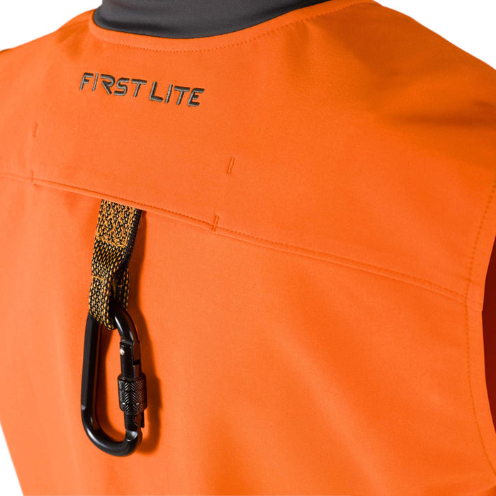 Orange vest with a black "FIRST LITE" logo on the upper back and a black carabiner attached to a black and yellow strap.