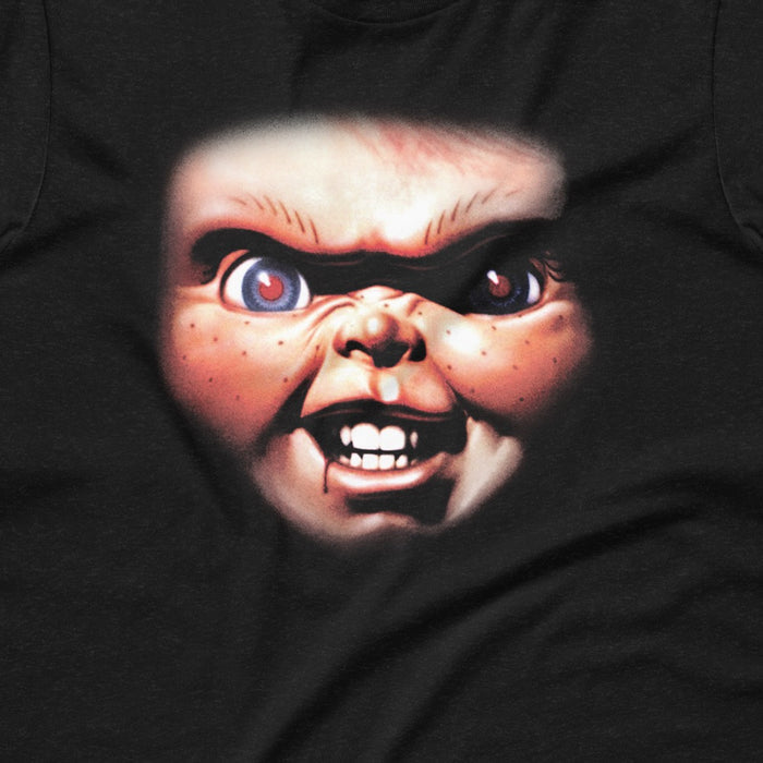 Close-up view of the Chucky graphic print on the front of the t-shirt