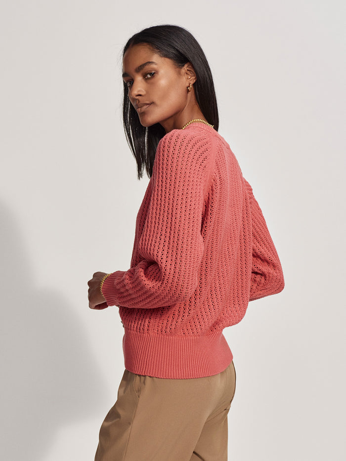 Mineral Red|Front-facing Varley Clay Knit Sweat in Mineral Red, a mineral-red knit with long sleeves and crew neck.