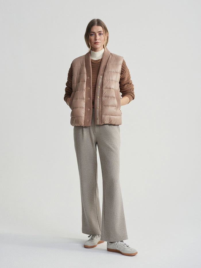 Chanterelle|Front view of the Colwyn Combo Boxy Gilet in Chanterelle, a sleeveless boxy vest with a modern, streamlined silhouette.