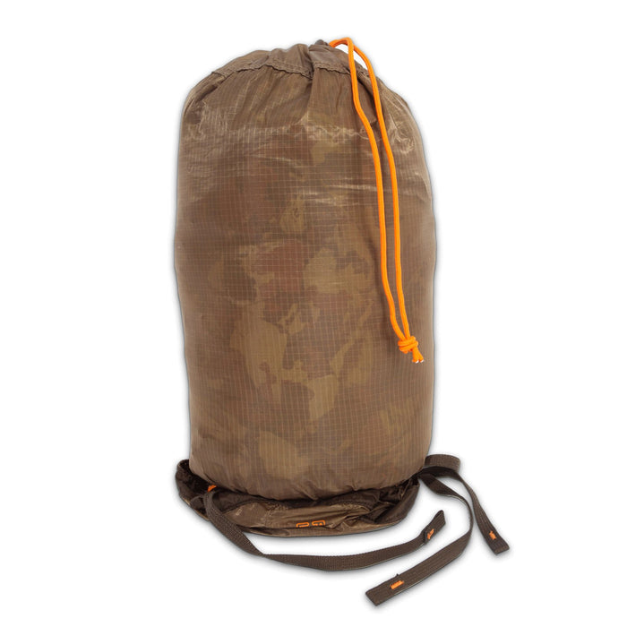 Brown ripstop stuff sack with subtle camo pattern, orange drawstring closure, and dark brown compression straps.