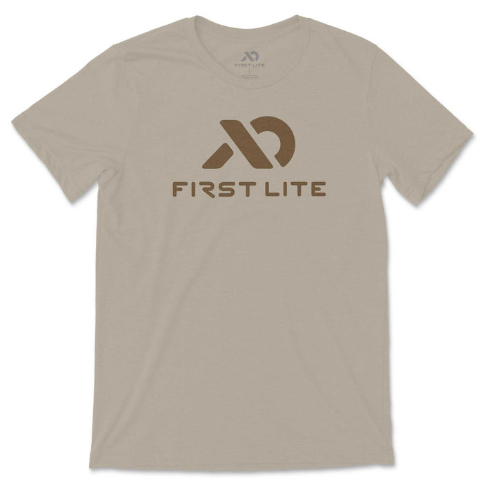Beige t-shirt with a brown "FIRST LITE" logo and text on the chest.