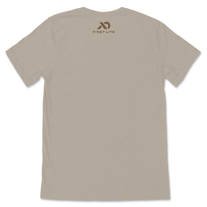 Tan short-sleeve T-shirt with a brown First Lite logo and text on the upper back.