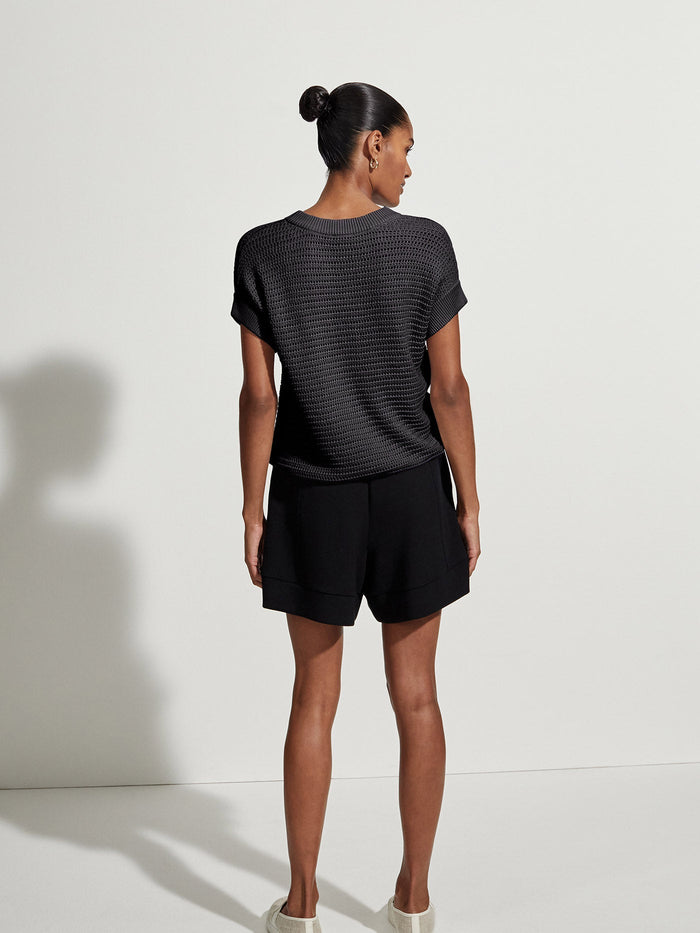 CORVALLIS_VAR00991_BLACK_3|Corvallis Var00991 Black front-view of a sleek, minimalist apparel piece.