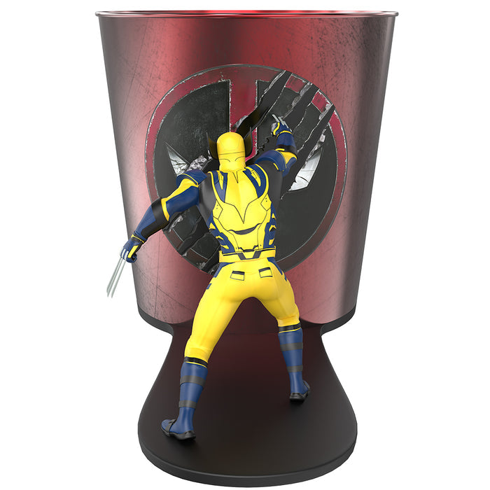 Front view of the Deadpool and Wolverine popcorn bucket featuring detailed figures of Deadpool and Wolverine mounted on top of the tin