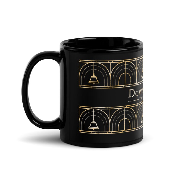 Black ceramic coffee mug featuring a refined 1930s art deco Downton Abbey The Grand Finale motif on the front