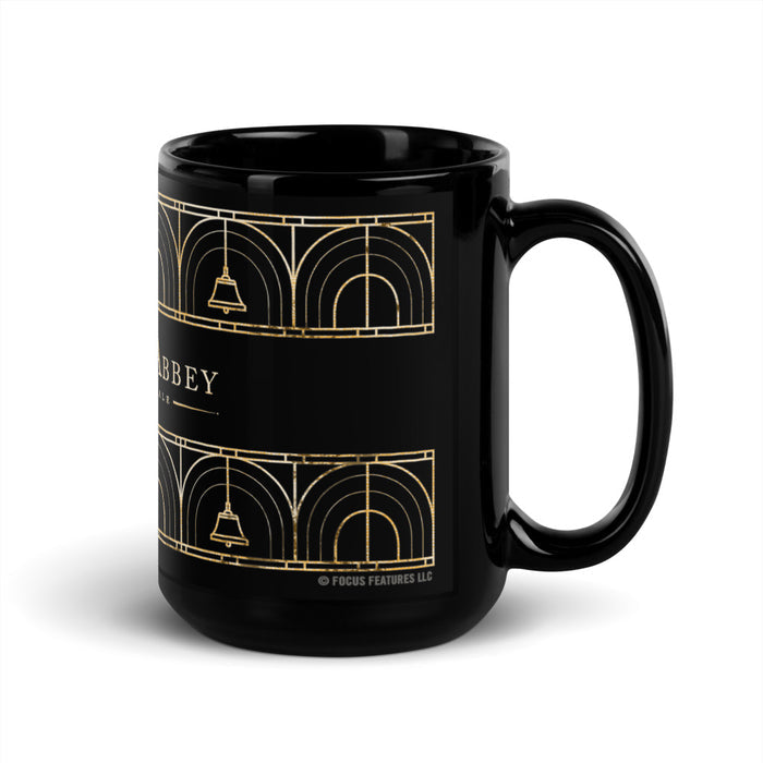 Back view of the black ceramic mug showing the smooth, unprinted reverse side