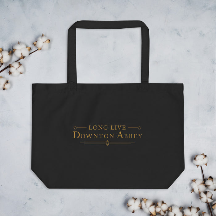 Interior view of the open main compartment of the black cotton tote bag