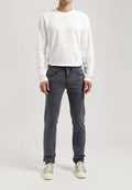 Sustainable MUD Jeans in dark denim, classic fit, showcasing ethical fashion with eco-friendly materials.