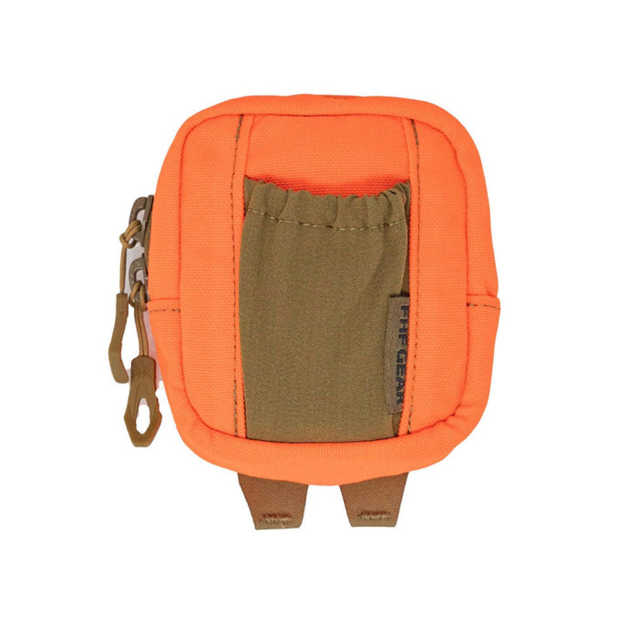 Orange utility pouch featuring a brown elastic front pocket, a side zipper with a brown pull, and two brown webbing loops on the bottom.