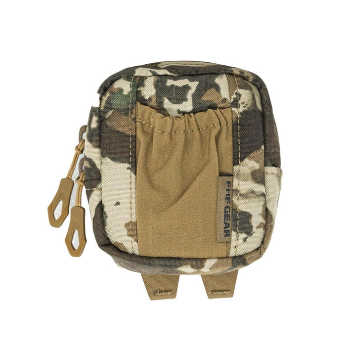 Multicam camouflage gear pouch with a tan elastic front pocket, two tan zipper pulls, and an FHF GEAR tag.