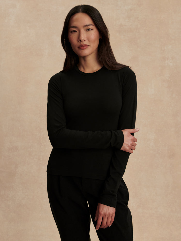 Black|Edna Long Sleeve Fitted Tee in Black, slim-fit silhouette with crew neck and long sleeves.