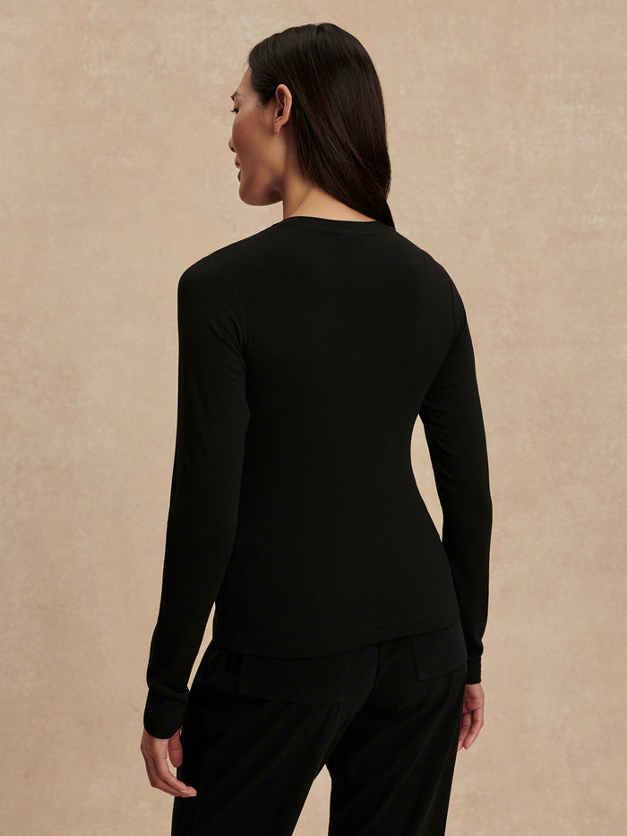 Black|Edna Long Sleeve Fitted Tee in black, front view showing a sleek, body-skimming silhouette with long sleeves.