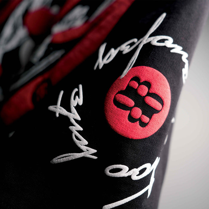 Premium oversized black t-shirt with bold puff graphics