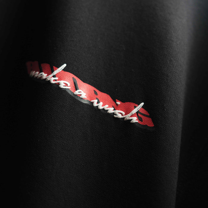 Premium black oversized t-shirt with statement puff art