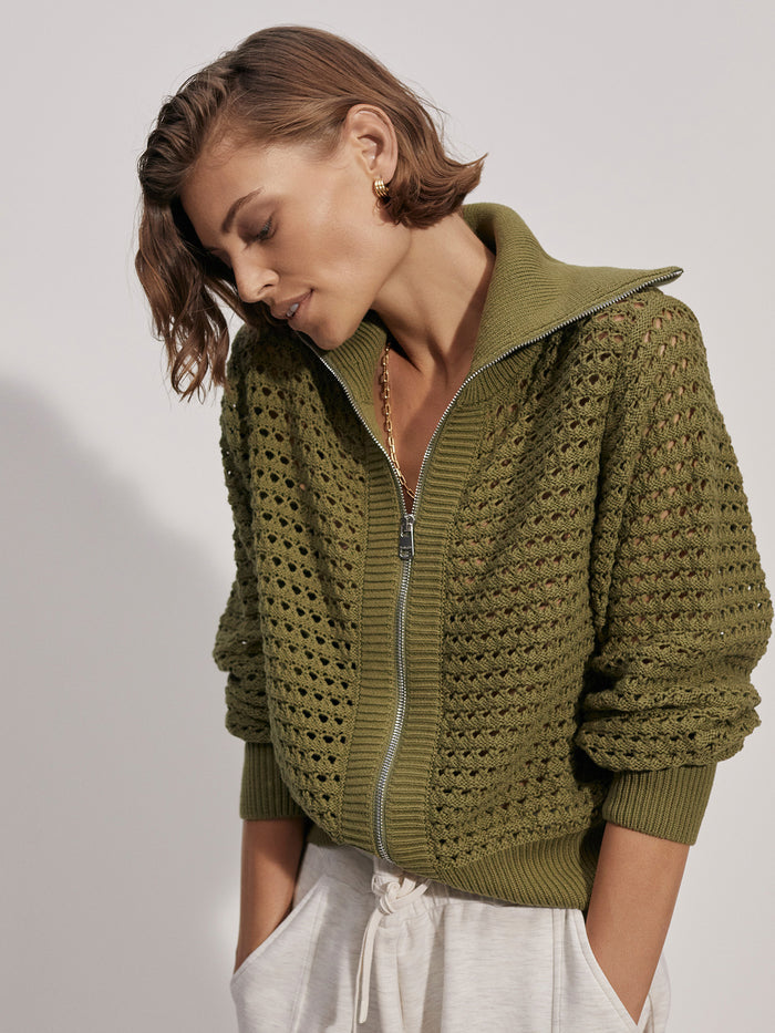 |Front view of the Varley Eloise full-zip knit in Fresh Fern green, showing a full-zip front and ribbed cuffs and hem.