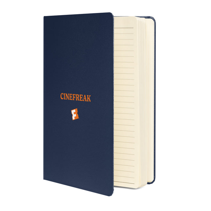 Close-up of the Cinefreak graphic debossed on the navy blue notebook cover