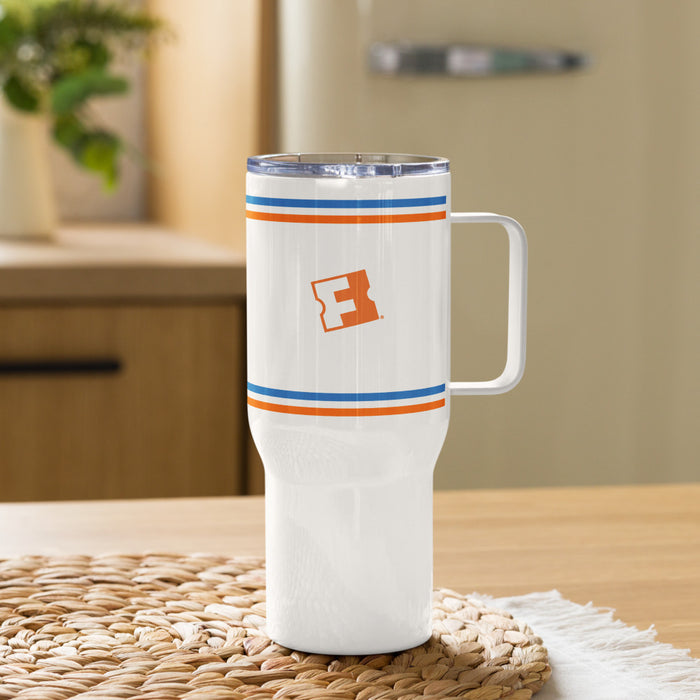 Lifestyle view of the Fandango Cinefreak travel mug resting on a flat surface