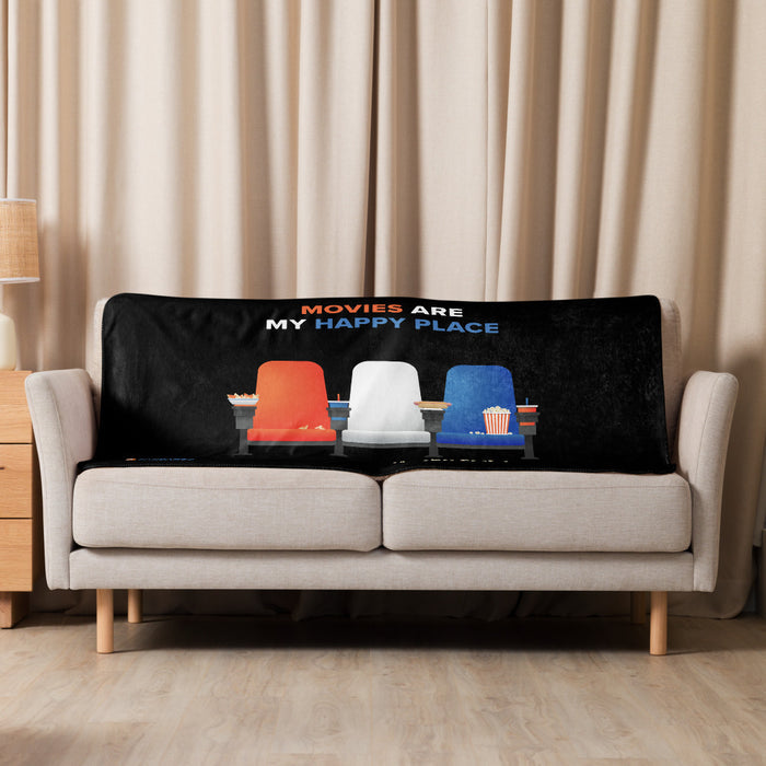 Folded Fandango throw blanket resting on a neutral couch