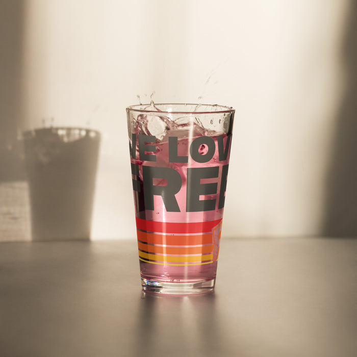 16 oz Fandango Retro We Love Free pint glass on a flat surface
