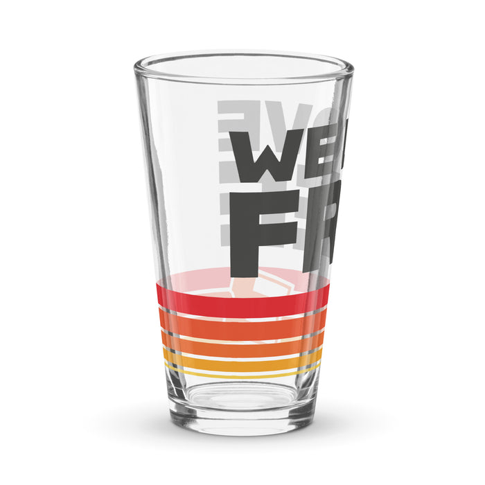 Close-up of the retro We Love Free graphic on Fandango pint glass