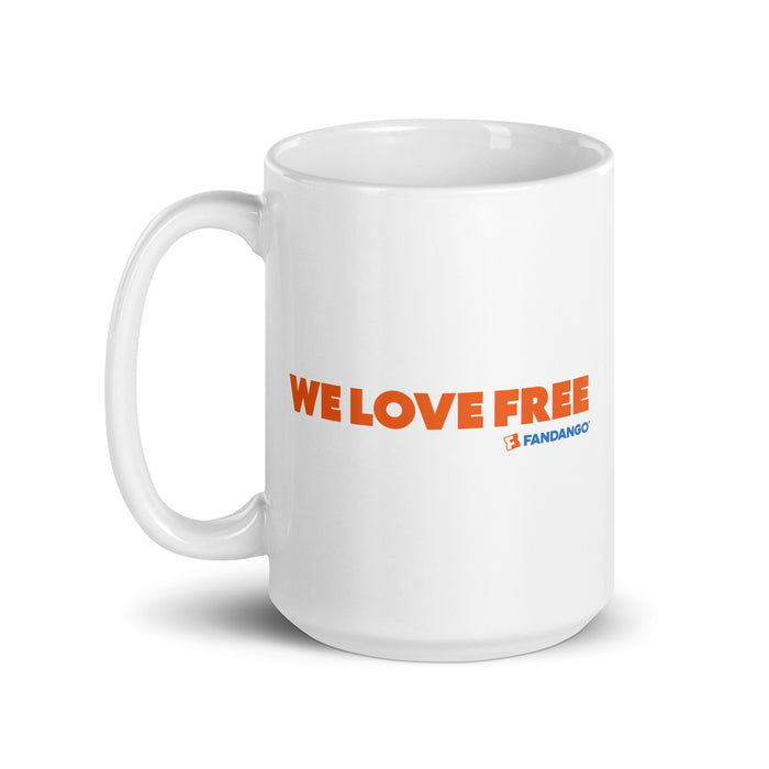 Fandango We Love Free White Mug next to coffee beans and a morning setup