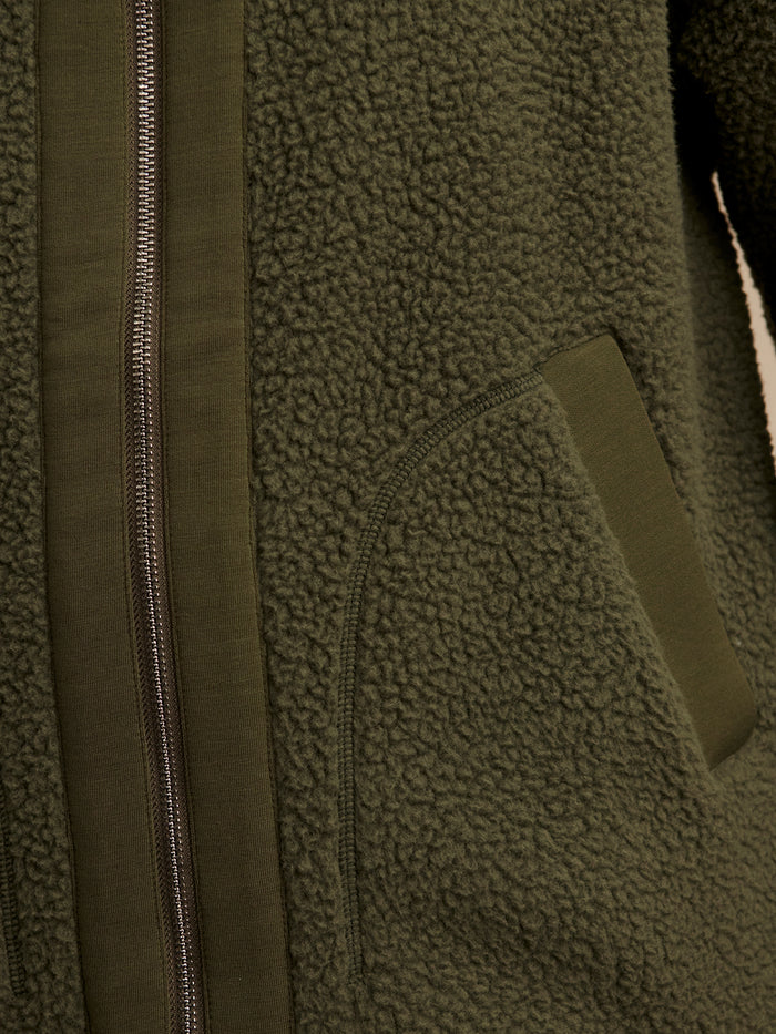 Racing Olive|Fey Relaxed Fleece Racing Olive jacket in olive color with a relaxed-fit fleece fabric.