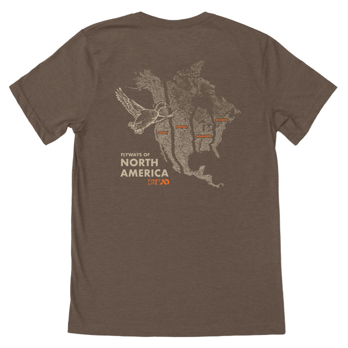 Brown T-Shirt with a beige map of North and Central America and a duck, and text "FLYWAYS OF NORTH AMERICA" and "FIRST LITE" below.