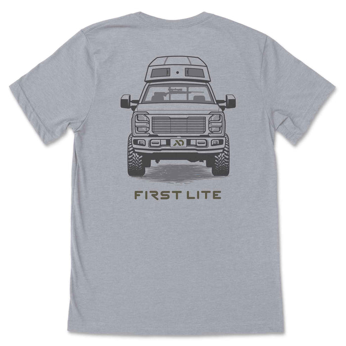 Light grey t-shirt with a back graphic of a lifted pickup truck, rooftop tent, a rifle, and "FIRST LITE" text.