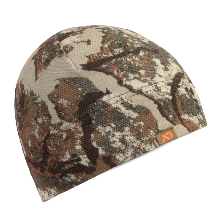 Camouflage beanie with a mottled tan, brown, green, and rust pattern, featuring a small orange logo tag on the brim.