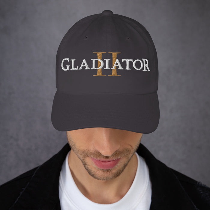 Close-up of the Gladiator II embroidery detail centered on the front of the asphalt dad hat