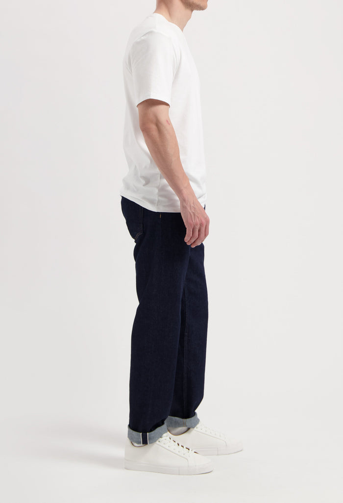Sustainable MUD Jeans and denim jacket set, crafted from organic cotton, showcasing a classic blue wash and ethical design.