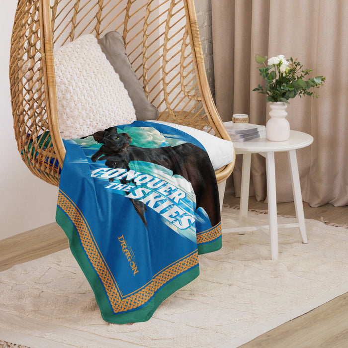 Detailed view of the dragon artwork graphic printed on the plush throw
