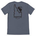 Slate gray t-shirt with a black graphic on the back featuring the Idaho outline, an elk silhouette, and "FIRST LITE HAILEY, IDAHO EST. 2007" text
