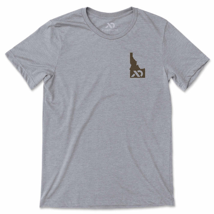 Gray t-shirt with Idaho outline logo on a white background
