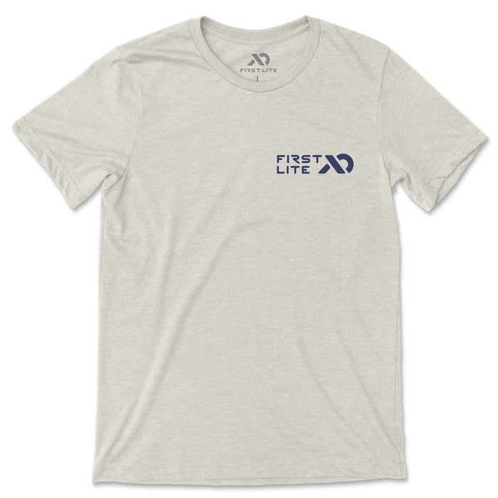 Heather grey t-shirt with a blue 'FIRST LITE' chest logo and matching neck print.