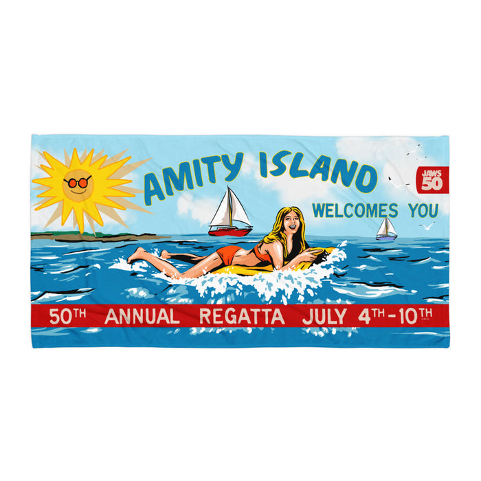 Jaws 50th Anniversary Amity Island beach towel laid flat, showing the full vibrant graphic and 30 by 60 inch layout