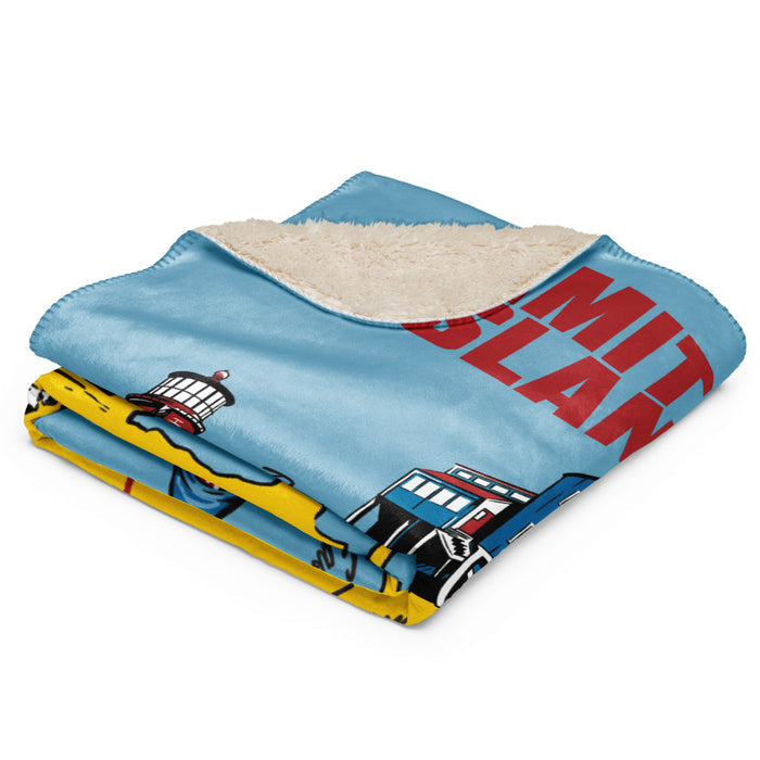 Full view of the Jaws Amity Island blanket draped over a living room sofa