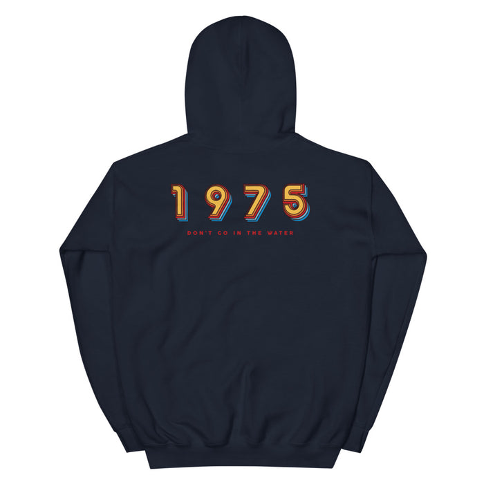 Close-up of the vintage-style Amity Island graphic on the front of the navy hoodie