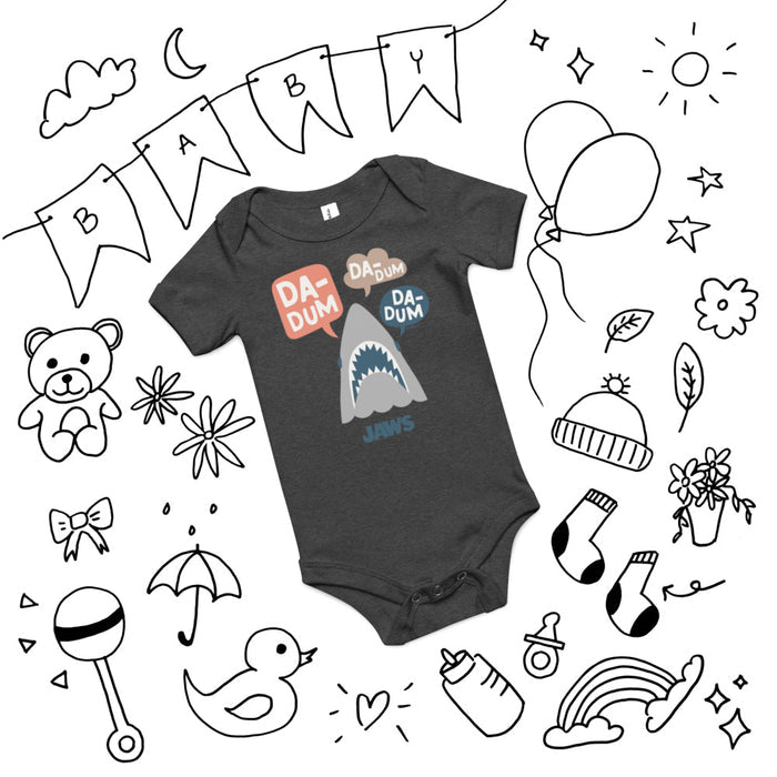 Close-up of the Jaws graphic and fabric texture on the dark grey heather baby bodysuit