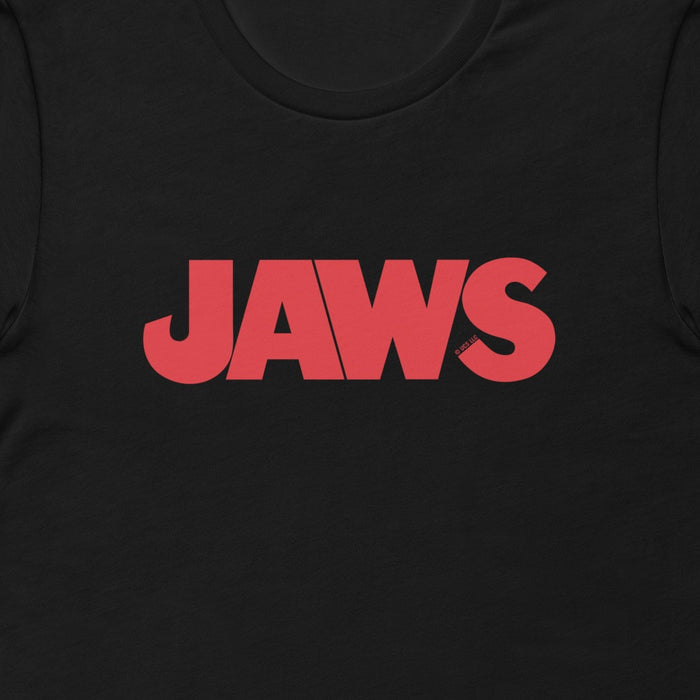 Close-up of the Jaws movie logo graphic on the black t-shirt fabric
